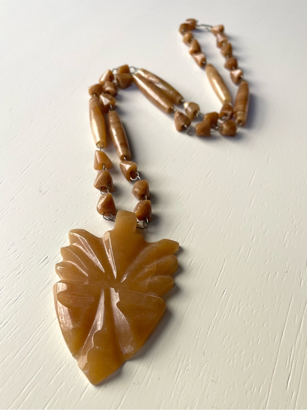 Vintage carved stone (agate/onyx?) necklace w/ tomahawk/face boho